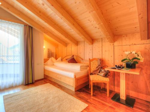 Postel nebo postele na pokoji v ubytování Hotel Verwall