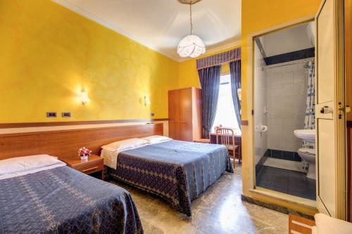 Postel nebo postele na pokoji v ubytování Guest Planet