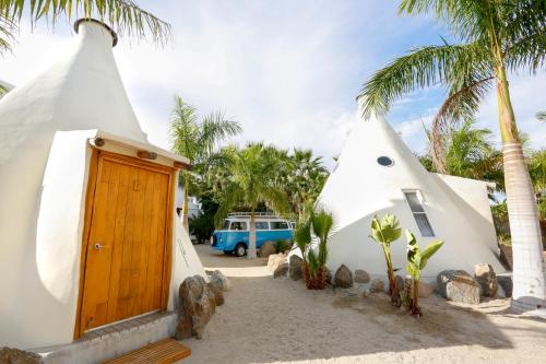 a couple of yurt homes on the beach at Tribu Todos Santos in Todos Santos