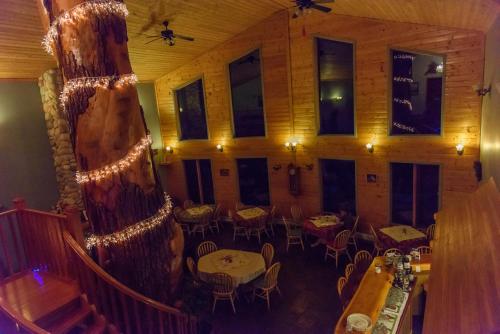 an overhead view of a restaurant with tables and chairs at Glenogle Mountain Lodge and Spa in Golden