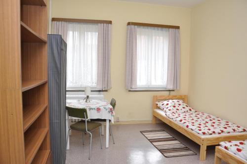 Ein Bett oder Betten in einem Zimmer der Unterkunft Hostel Herberge Werratal