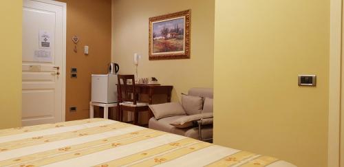 เตียงในห้องที่ La Regibussa - Hotel Ristorante