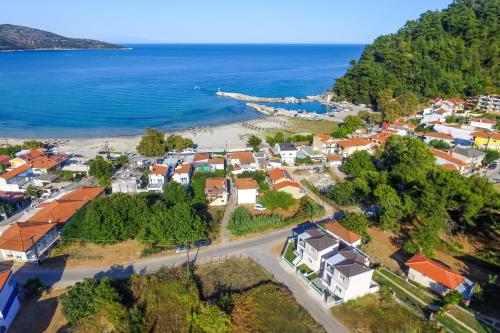 an aerial view of a town next to the ocean at Foti's Villas in Skala Potamias