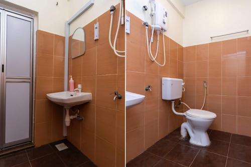 a bathroom with a toilet and a sink at I Harmony Hotel in Johor Bahru