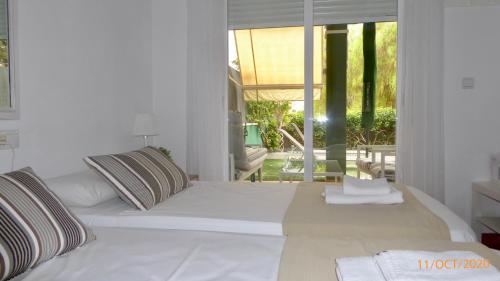 Krevet ili kreveti u jedinici u okviru objekta Maison Illeta Golf Bonalba
