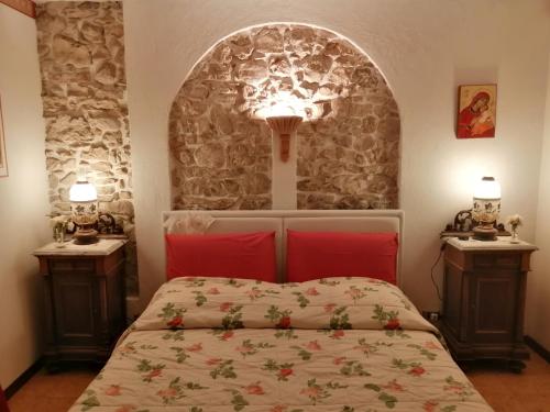 B&B da Paolo con vista Lago di Garda tesisinde bir odada yatak veya yataklar