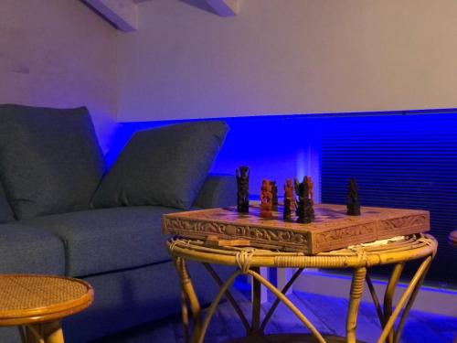 a chess board on a table in a living room at Portale dei Soli - Room & Breakfast in Rolo