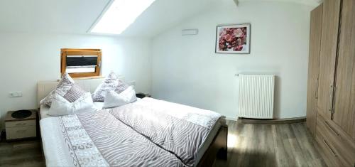 Katil atau katil-katil dalam bilik di Ferienwohnung Alpenfex