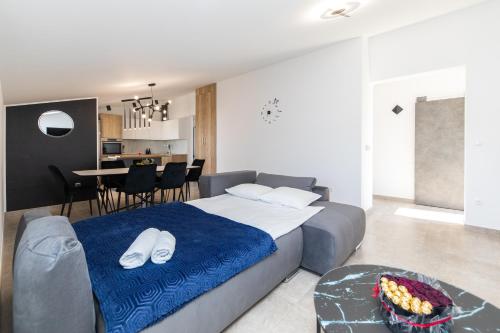 Postel nebo postele na pokoji v ubytování Apartman Gulin