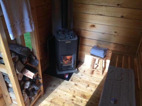 an overhead view of a wood stove in a cabin at Villa Sankt Olof in Sankt Olof