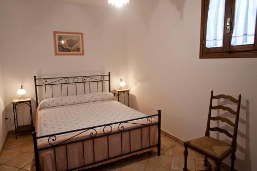 Postel nebo postele na pokoji v ubytování Residencefusaro pajare Specchia