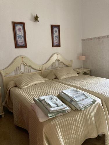 Ένα ή περισσότερα κρεβάτια σε δωμάτιο στο Casa Cary