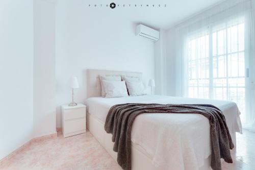 Postel nebo postele na pokoji v ubytování San Cristobal Apartment - Alicante City Center