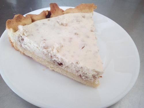 a piece of pie on a white plate at Le Relais des Cavaliers in Villeneuve-dʼEntraunes