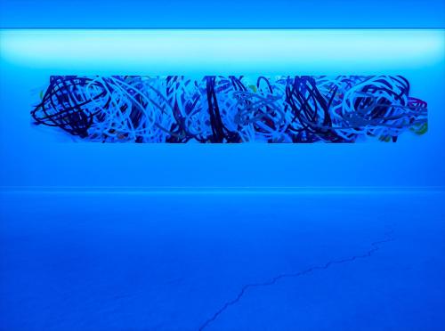 a close up of a pile of blue graffiti at HOTEL ANTEROOM NAHA in Naha