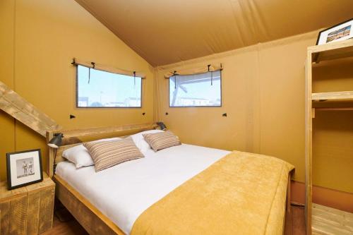 Postel nebo postele na pokoji v ubytování Camping Park Umag Glamping