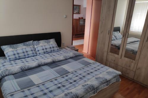 Postel nebo postele na pokoji v ubytování Allegro dream