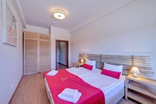 
Кровать или кровати в номере Hotel Vostochnaya Aziya Etnomir
