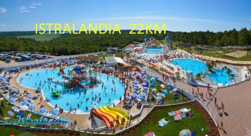an aerial view of a water park with two pools at Floating House Sea Queen in Portorož