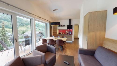 Appartement Kitzsteinhorn -Summercard includedにあるシーティングエリア