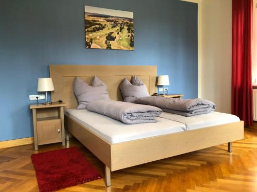 Katil atau katil-katil dalam bilik di Appartements am Rindhof