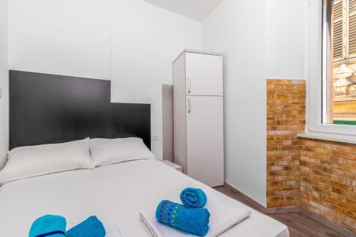 Voodi või voodid majutusasutuse Apartmani Dada toas