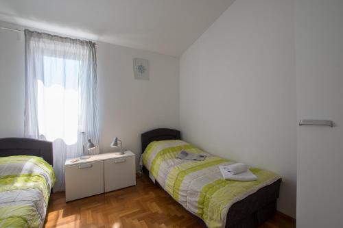 מיטה או מיטות בחדר ב-Villas Faro