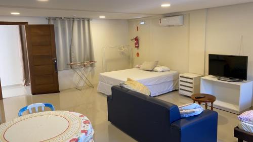 เตียงในห้องที่ Apartamento centro Porto belo!!