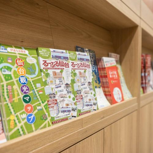 a shelf in a store with a map on it at Super Hotel Sendai Hirose Dori in Sendai