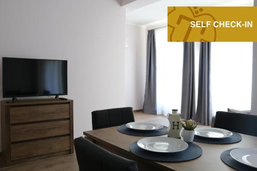 Телевизор и/или развлекательный центр в Apartments Moravská 24