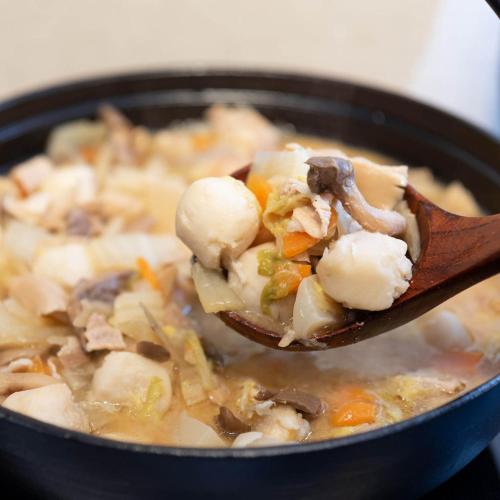 a spoonful of soup with mushrooms and vegetables at Super Hotel Sendai Hirose Dori in Sendai