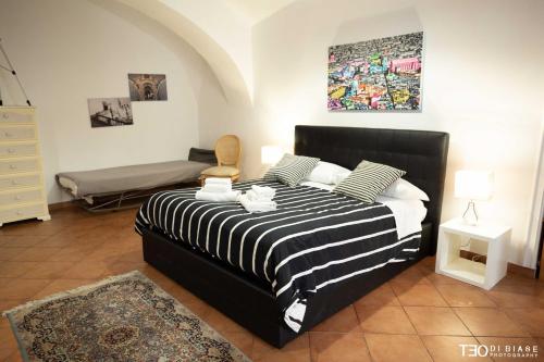 Ліжко або ліжка в номері La Loggia di Cassano by Dimorra