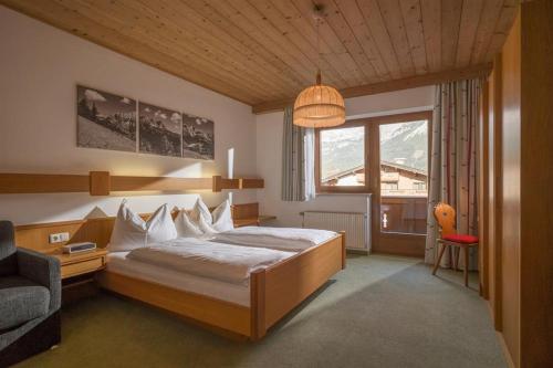 Кровать или кровати в номере Haus Auermühle