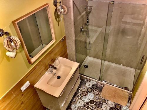 Et badeværelse på Apartament „Green Wall”