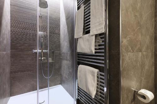Vonios kambarys apgyvendinimo įstaigoje Contempora Apartments - Turati 4 Bedrooms Apartment