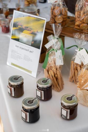 a table with cookies and other food items on it at Villa Anitori Prestige Relais & Spa in Loro Piceno