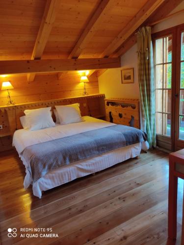 Säng eller sängar i ett rum på Chalet Altitude 1057