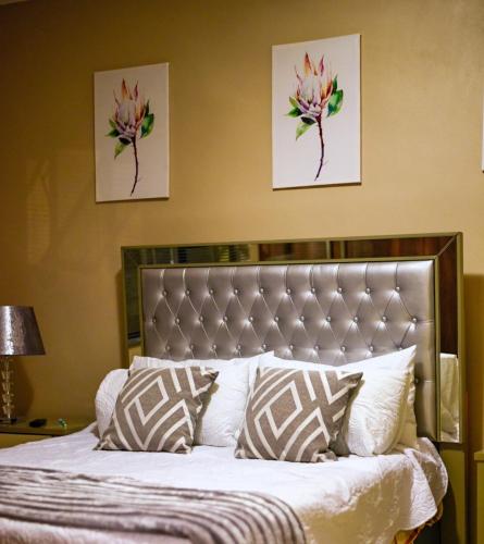 Ένα ή περισσότερα κρεβάτια σε δωμάτιο στο Valleyside Executive Apartments