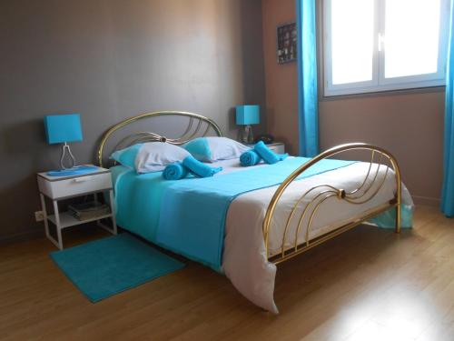 Ліжко або ліжка в номері Gîte de Eric et Rose