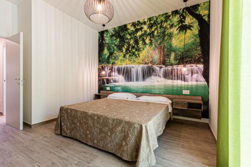 Suite du Parc & Hotel tesisinde bir odada yatak veya yataklar