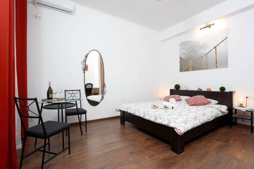Кровать или кровати в номере La Copac Cozy Stay