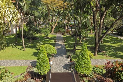 A garden outside Bintang Bali Resort