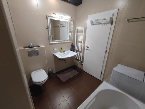 Et badeværelse på Zagreb Lodge Apartment