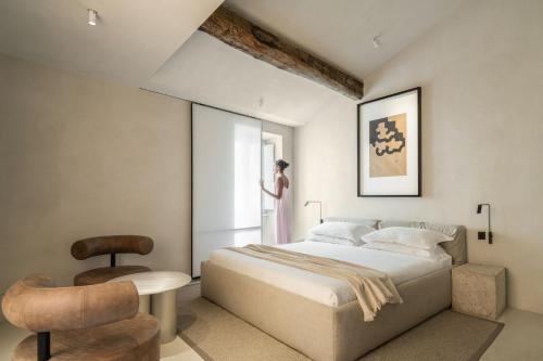 Ένα ή περισσότερα κρεβάτια σε δωμάτιο στο Hotel Scenario