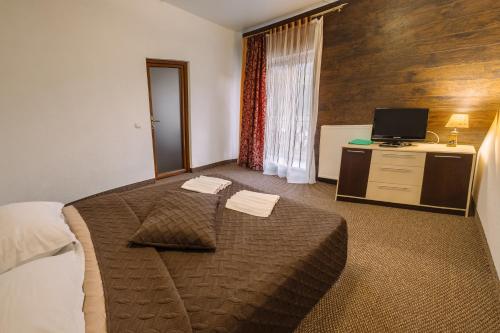 SPA Hotel Zhyva Vodaにあるベッド
