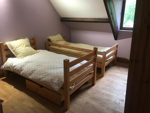 Cama ou camas em um quarto em Domaine des Courtils