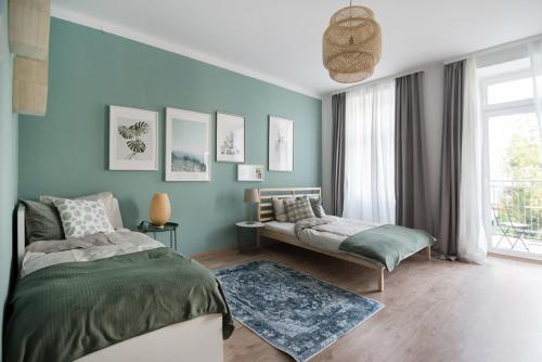Posteľ alebo postele v izbe v ubytovaní Caring Family Apartment Close To The Center