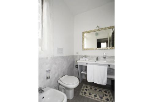 Ванная комната в ILLUVIA affitto camere