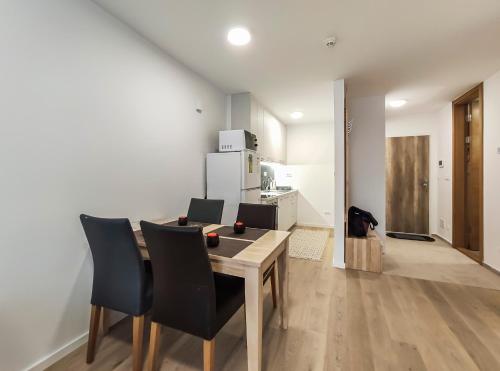 Kuchyň nebo kuchyňský kout v ubytování Apartmani Jahorina Olimpijska kuca