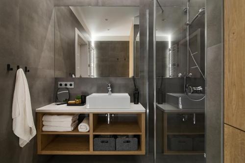 Ett badrum på Free Time Apartments